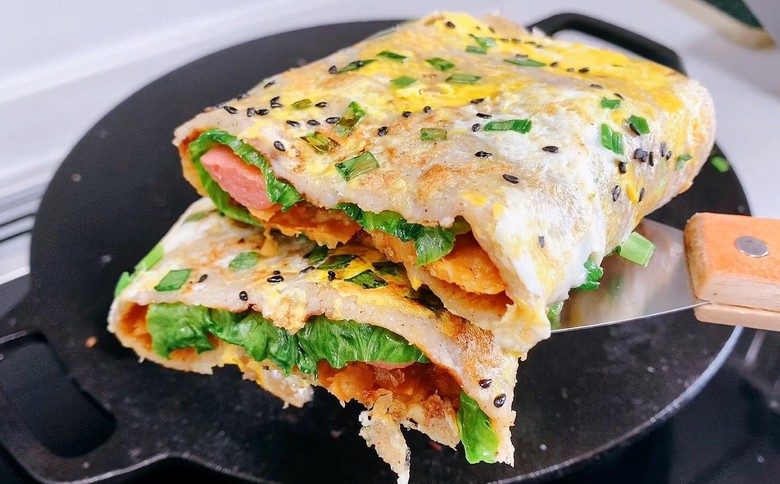 想學(xué)煎餅果子？學(xué)煎餅果子去哪學(xué)？這里的技術(shù)學(xué)習(xí)方法最靠譜！(圖2)